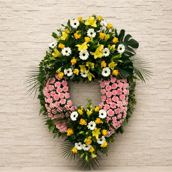 corona_claveles_rosas_2_cabeceros_amarillos